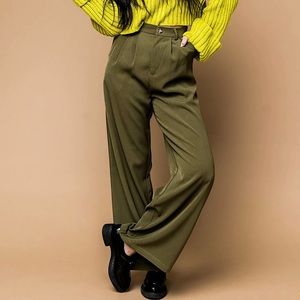 Olive Dressed in LALA trousers in size Large